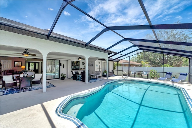 view of pool featuring a fenced in pool, a patio, ceiling fan, and fence