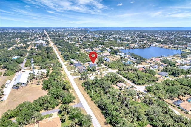 aerial view with a residential view and a water view