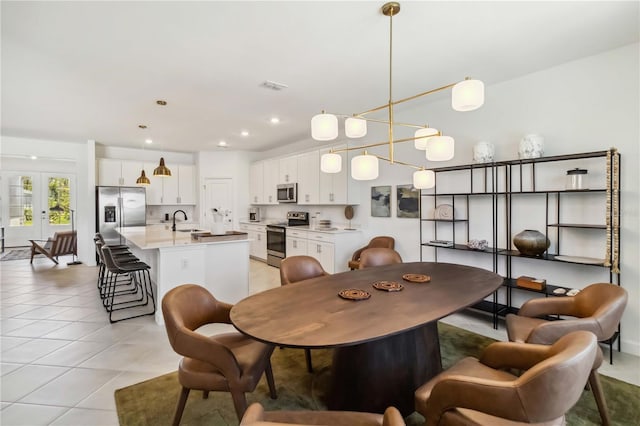 dining room featuring light tile patterned floors, french doors, recessed lighting, and visible vents