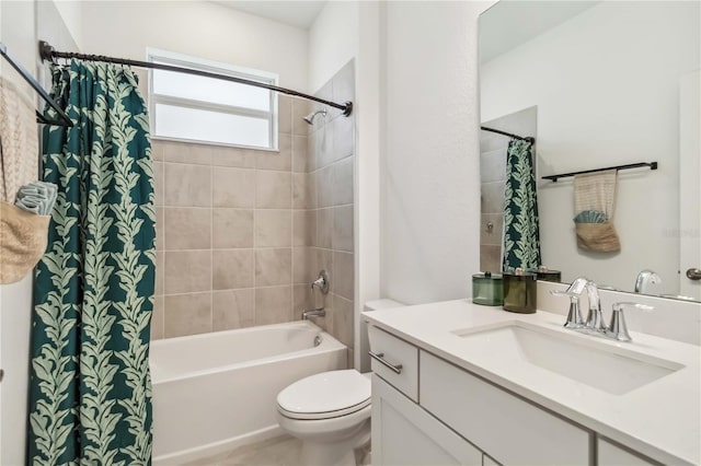 full bath featuring toilet, shower / bathtub combination with curtain, and vanity