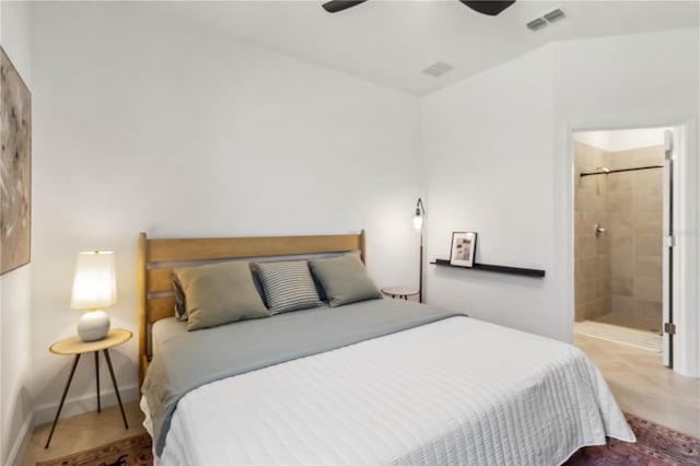 bedroom featuring visible vents, a ceiling fan, and connected bathroom