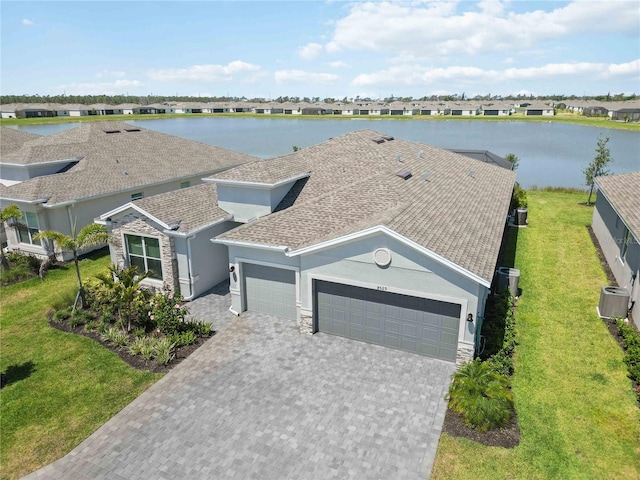 aerial view featuring a residential view and a water view