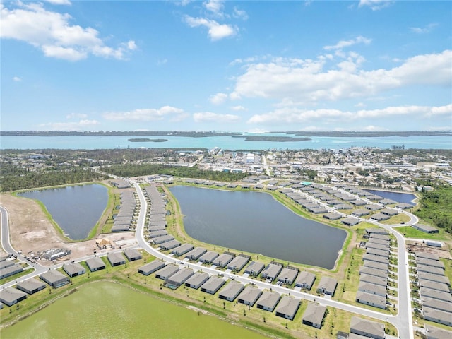 aerial view featuring a water view and a residential view