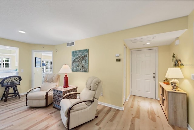 819 Montrose Dr Unit 102, Venice, FL 34293 - sitting room with recessed lighting, baseboards, visible vents, and light wood-style floors