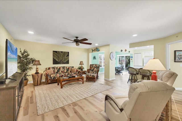819 Montrose Dr Unit 102, Venice, FL 34293 - living room featuring baseboards, ceiling fan, recessed lighting, and light wood-style flooring