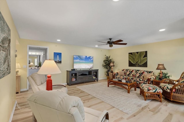 819 Montrose Dr Unit 102, Venice, FL 34293 - living area with light wood-style floors, baseboards, a ceiling fan, and recessed lighting