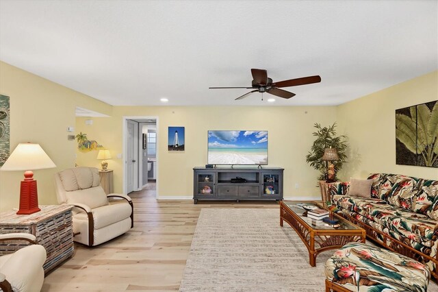 819 Montrose Dr Unit 102, Venice, FL 34293 - living area featuring a ceiling fan, baseboards, recessed lighting, and light wood-style floors