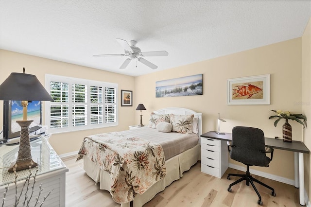 819 Montrose Dr Unit 102, Venice, FL 34293 - bedroom featuring light wood-type flooring, baseboards, and ceiling fan