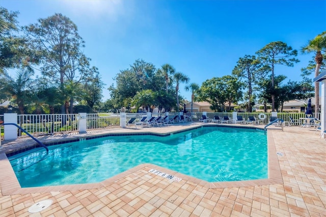 819 Montrose Dr Unit 102, Venice, FL 34293 - community pool featuring a patio and fence