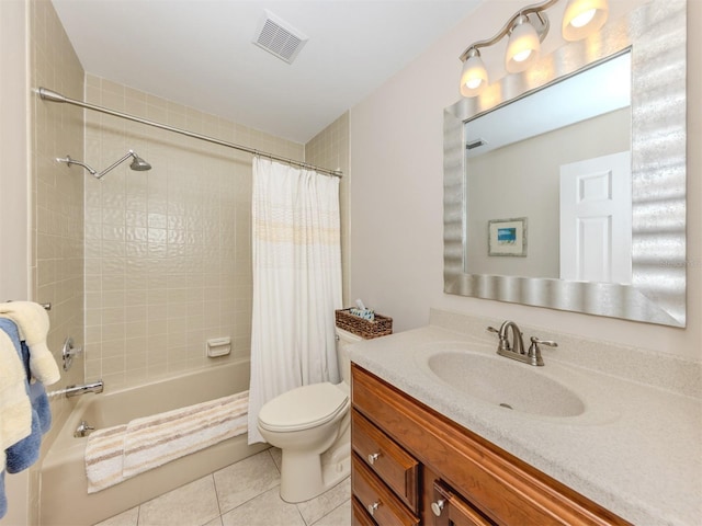 bathroom featuring toilet, shower / tub combo with curtain, tile patterned floors, visible vents, and vanity