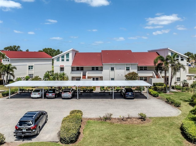view of property with covered parking