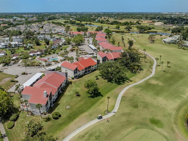 bird's eye view featuring view of golf course and a water view