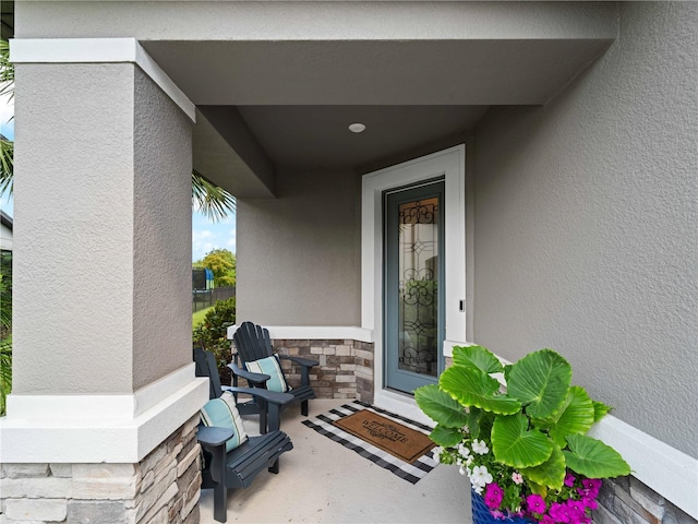 8304 Shooting Star Rd, Sarasota, FL 34241 - entrance to property featuring stone siding and stucco siding