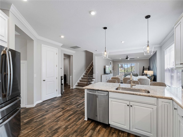 8304 Shooting Star Rd, Sarasota, FL 34241 - kitchen with freestanding refrigerator, stainless steel dishwasher, a peninsula, a ceiling fan, and dark wood-type flooring