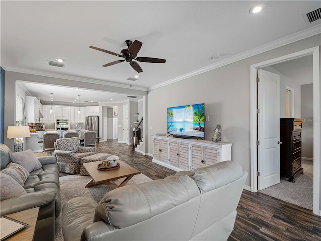 8304 Shooting Star Rd, Sarasota, FL 34241 - living room featuring baseboards, a ceiling fan, dark wood-style floors, recessed lighting, and ornamental molding