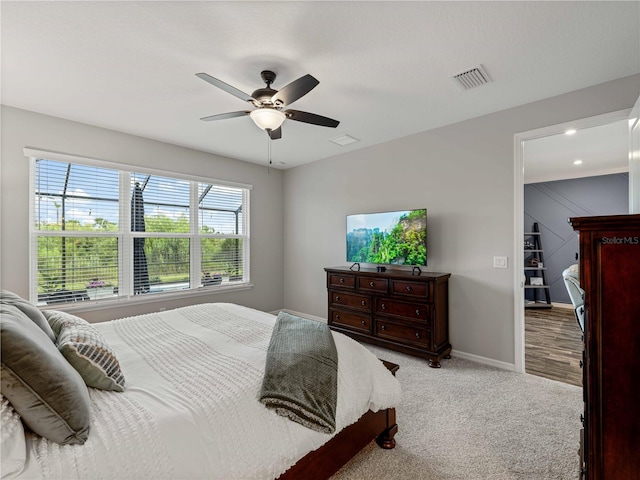 8304 Shooting Star Rd, Sarasota, FL 34241 - bedroom with carpet floors, baseboards, and a ceiling fan