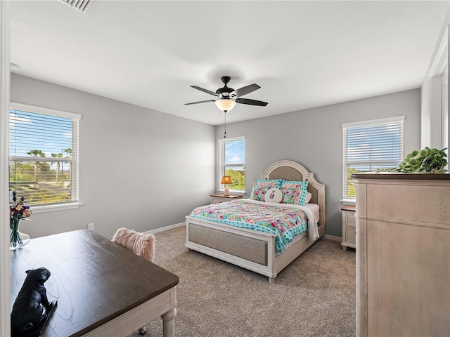 8304 Shooting Star Rd, Sarasota, FL 34241 - bedroom featuring light colored carpet, ceiling fan, and baseboards