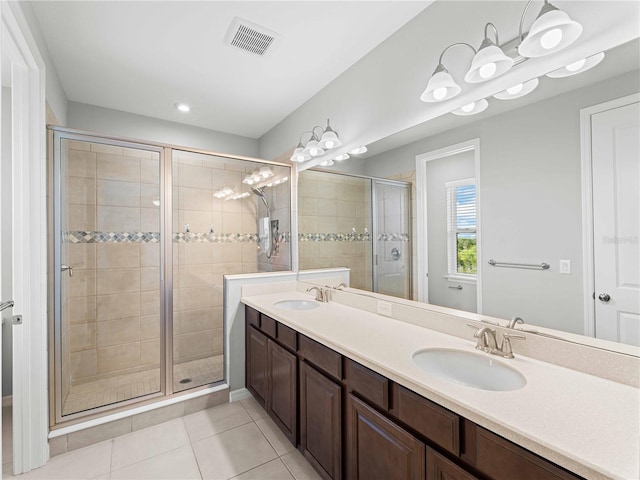 8304 Shooting Star Rd, Sarasota, FL 34241 - bathroom with a stall shower, tile patterned floors, and double vanity