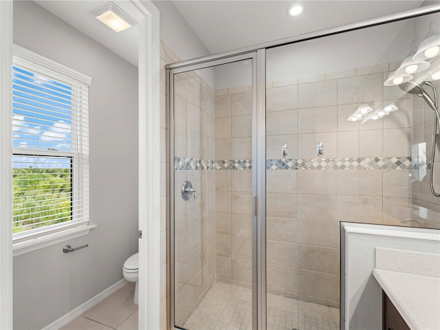 8304 Shooting Star Rd, Sarasota, FL 34241 - bathroom featuring a stall shower, vanity, toilet, tile patterned floors, and baseboards