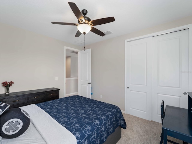 8304 Shooting Star Rd, Sarasota, FL 34241 - bedroom with carpet, a closet, and a ceiling fan