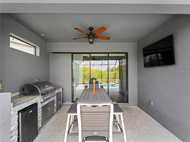 8304 Shooting Star Rd, Sarasota, FL 34241 - view of patio / terrace featuring an outdoor kitchen, ceiling fan, area for grilling, and outdoor dining area