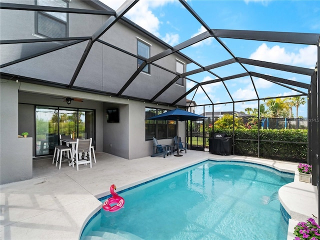 8304 Shooting Star Rd, Sarasota, FL 34241 - outdoor pool featuring a patio, a lanai, and a ceiling fan