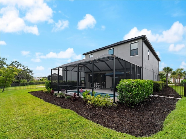 8304 Shooting Star Rd, Sarasota, FL 34241 - back of property with stucco siding, glass enclosure, and a patio area
