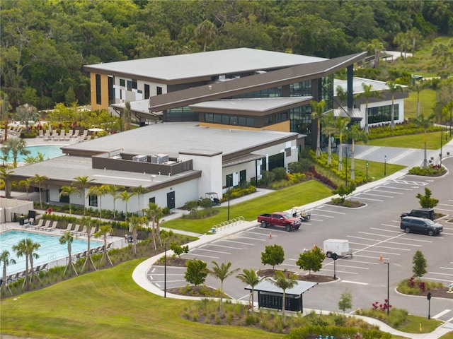 8304 Shooting Star Rd, Sarasota, FL 34241 - aerial view of a pool area and a forest