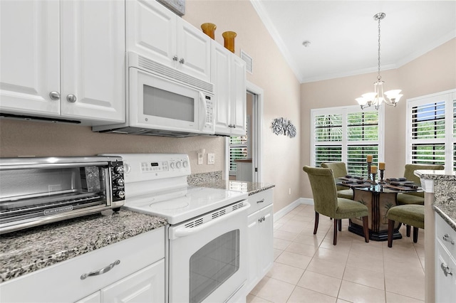 kitchen with an inviting chandelier, ornamental molding, a toaster, white appliances, and white cabinets