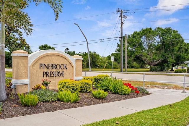 view of community sign