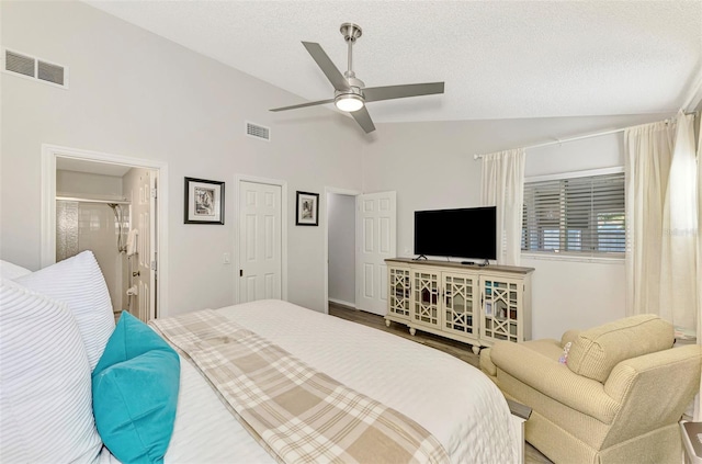 bedroom featuring a ceiling fan, a textured ceiling, visible vents, and wood finished floors