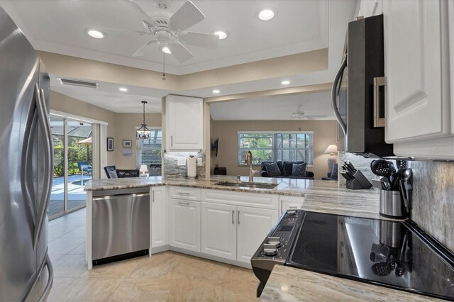316 Signorelli Dr, Nokomis, FL 34275 - kitchen with a sink, a ceiling fan, stainless steel appliances, and visible vents