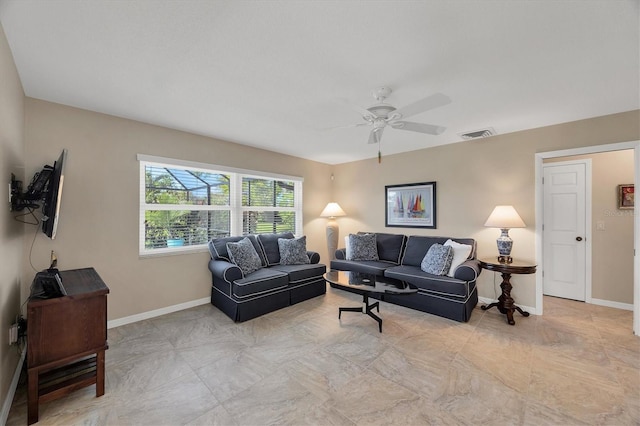 316 Signorelli Dr, Nokomis, FL 34275 - living area with baseboards, visible vents, and ceiling fan