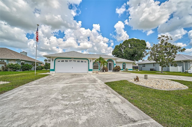 447 Rotonda Cir, Rotonda West, FL 33947 - ranch-style house with a front lawn, concrete driveway, an attached garage, and stucco siding
