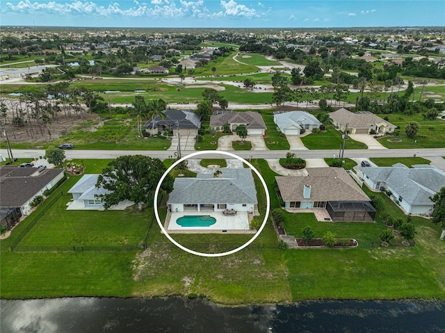 447 Rotonda Cir, Rotonda West, FL 33947 - aerial perspective of suburban area featuring a pool