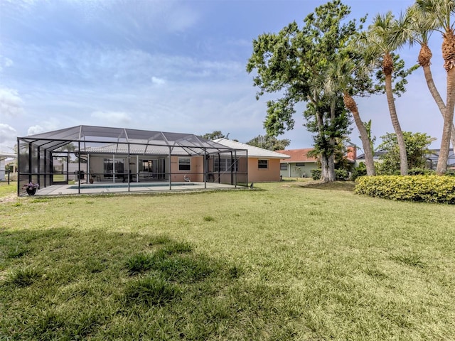 455 Rubens Dr E, Nokomis, FL 34275 - view of grassy yard featuring an outdoor pool and a lanai