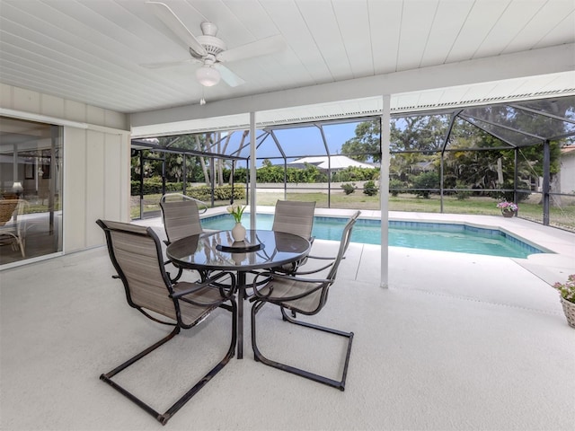 455 Rubens Dr E, Nokomis, FL 34275 - outdoor pool featuring a patio, a lanai, and a ceiling fan