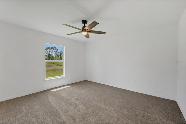 2032 Jagust Rd, North Port, FL 34288 - carpeted spare room featuring baseboards and ceiling fan