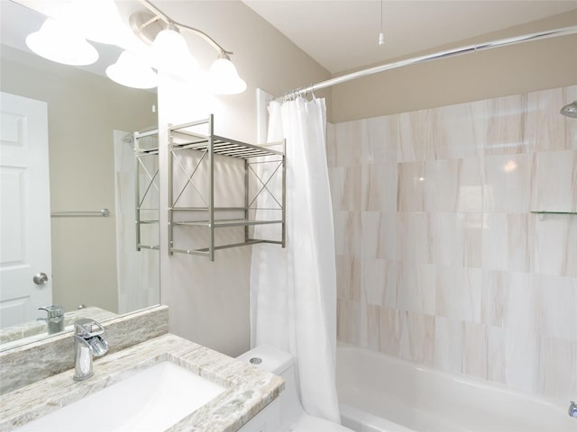 full bath featuring shower / bath combo with shower curtain, toilet, and vanity