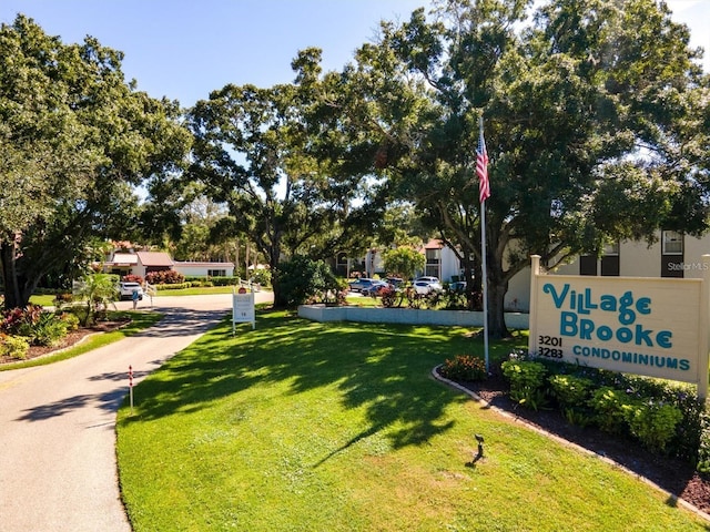 view of home's community featuring a yard
