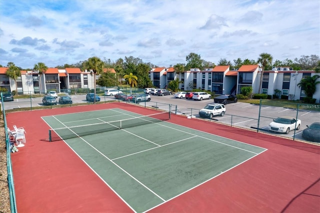 view of sport court with fence
