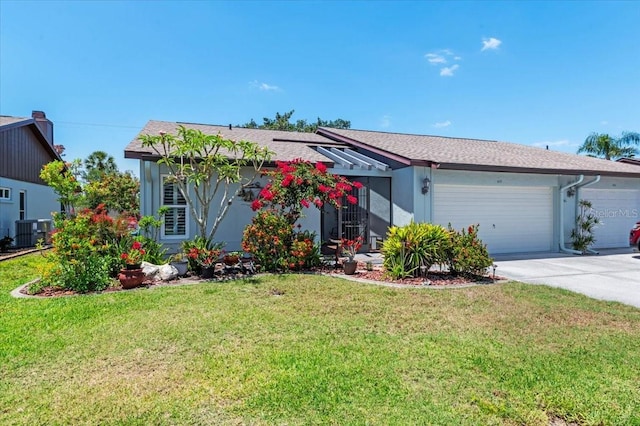 657 Foxwood Blvd, Englewood, FL 34223 - ranch-style house with an attached garage, concrete driveway, and a front yard