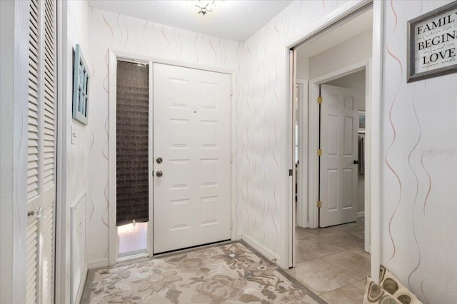 657 Foxwood Blvd, Englewood, FL 34223 - entrance foyer featuring baseboards