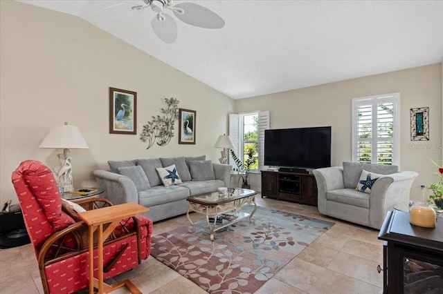 657 Foxwood Blvd, Englewood, FL 34223 - living room with plenty of natural light, lofted ceiling, ceiling fan, and tile patterned floors