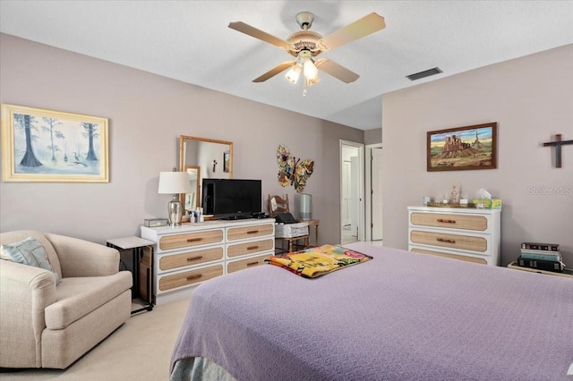657 Foxwood Blvd, Englewood, FL 34223 - bedroom featuring light colored carpet and a ceiling fan