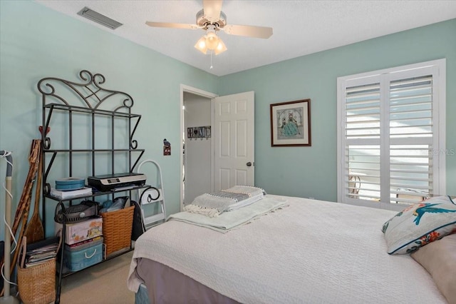 657 Foxwood Blvd, Englewood, FL 34223 - bedroom featuring carpet floors and a ceiling fan