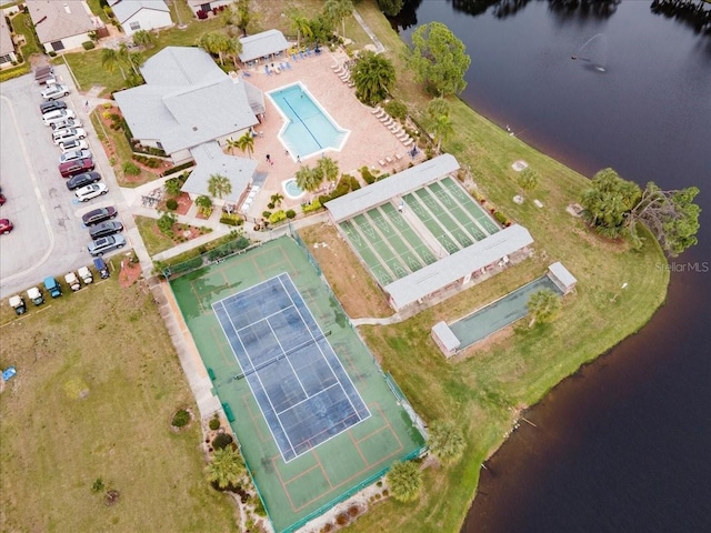 657 Foxwood Blvd, Englewood, FL 34223 - drone / aerial view of a pool and a large body of water