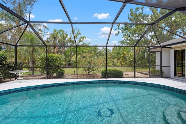 pool featuring a patio area and a lanai