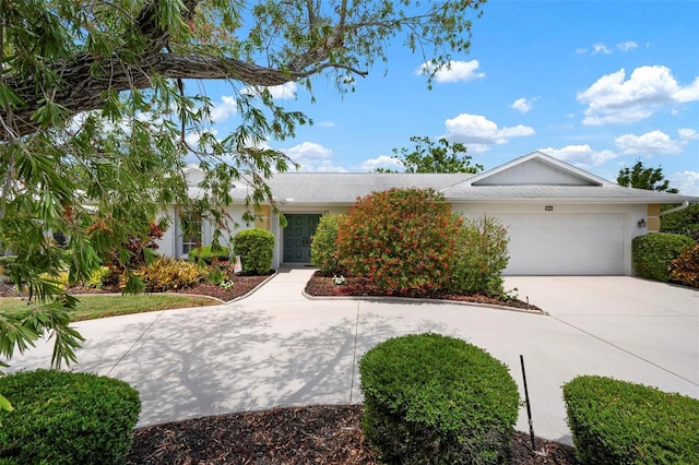 view of front of property with an attached garage and driveway