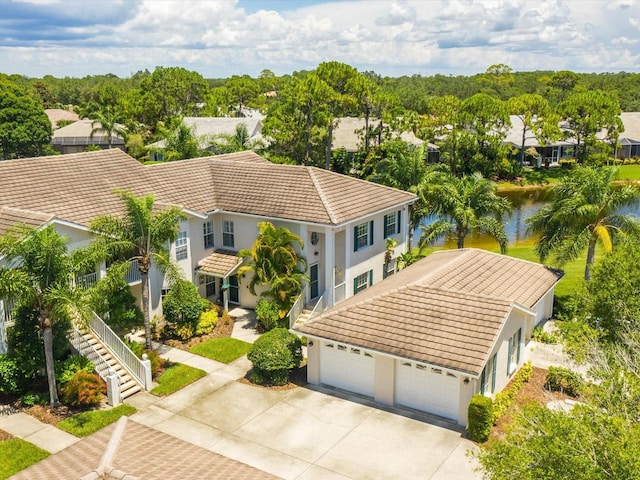 aerial view featuring a water view and a residential view